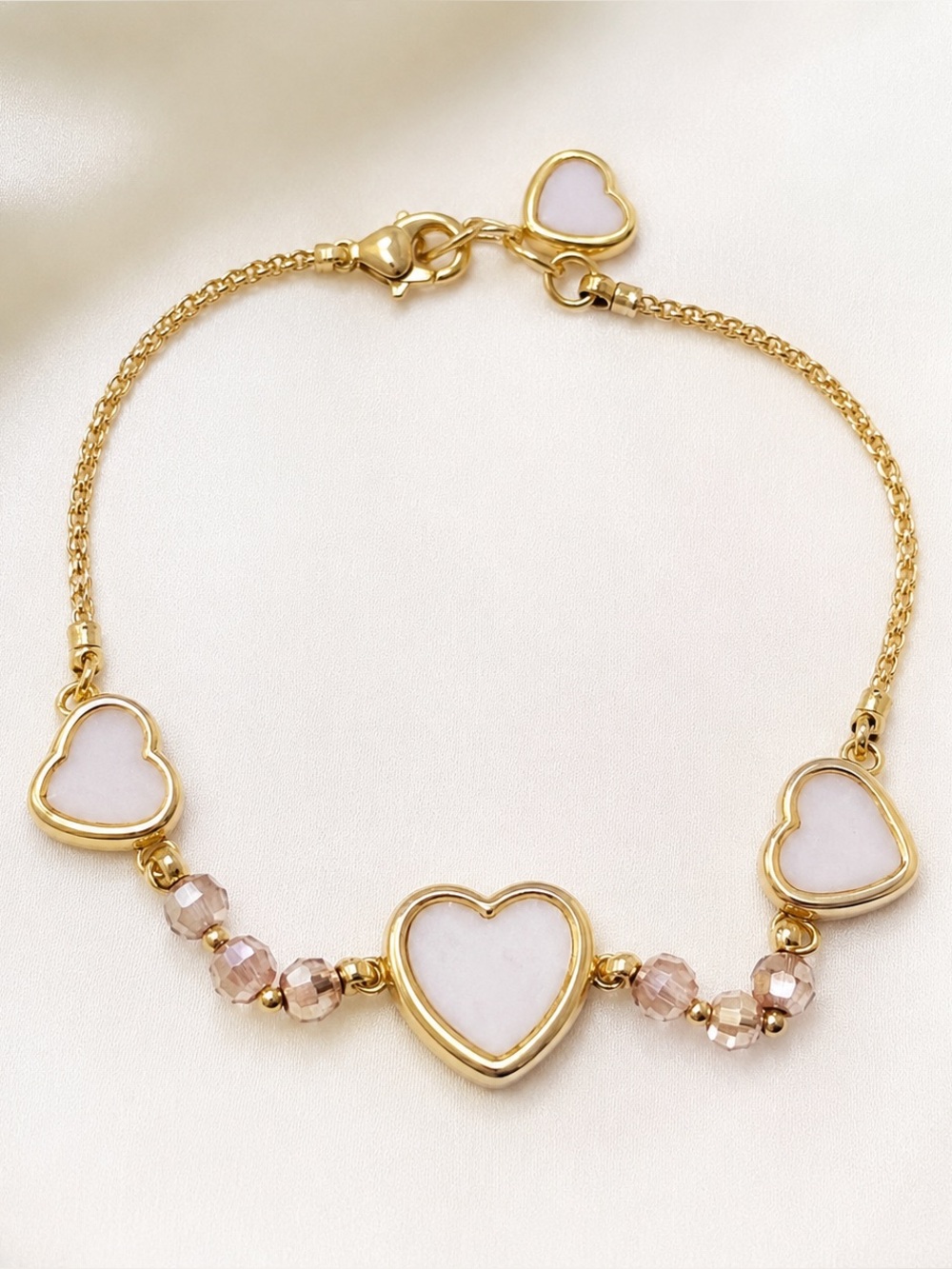 Gold Heart-Link Bracelet with Pink Inlay